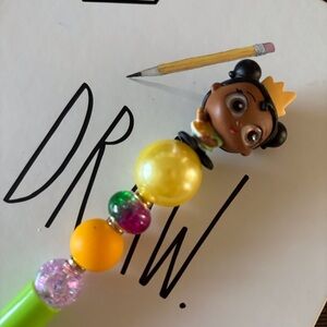 Disney doorables: The Princess and The Frog: Tiana as child handmade beaded pen